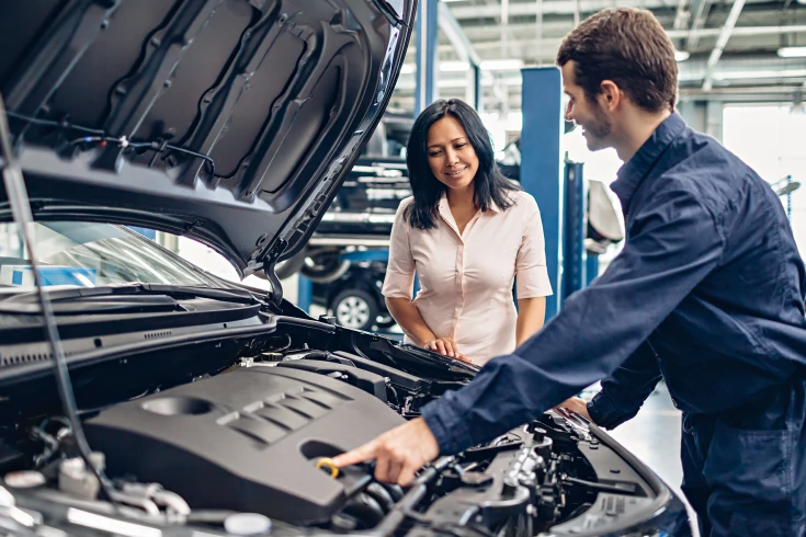 Image of a mechanic and a customer