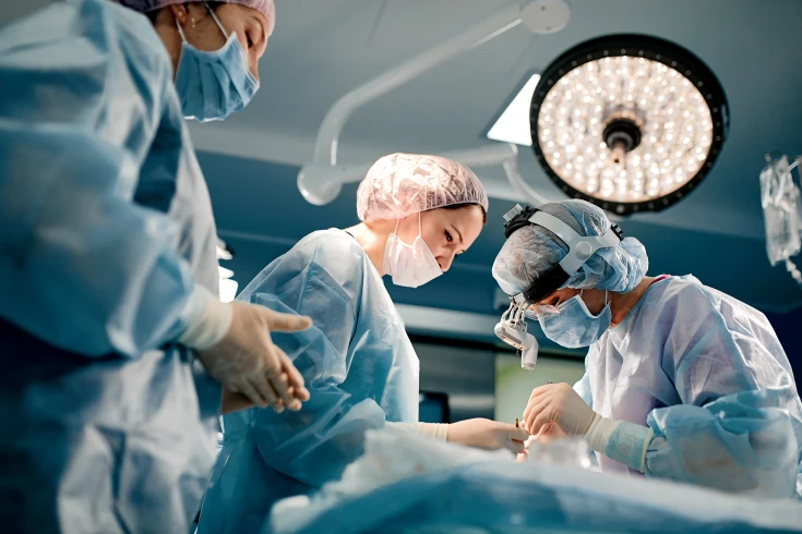 A heart bypass surgery is being performed in the theatre