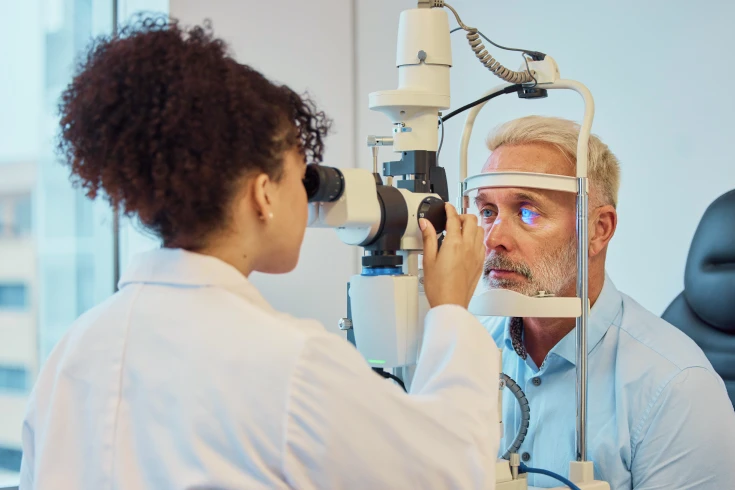 Man having his eyes checked by an eye specialist